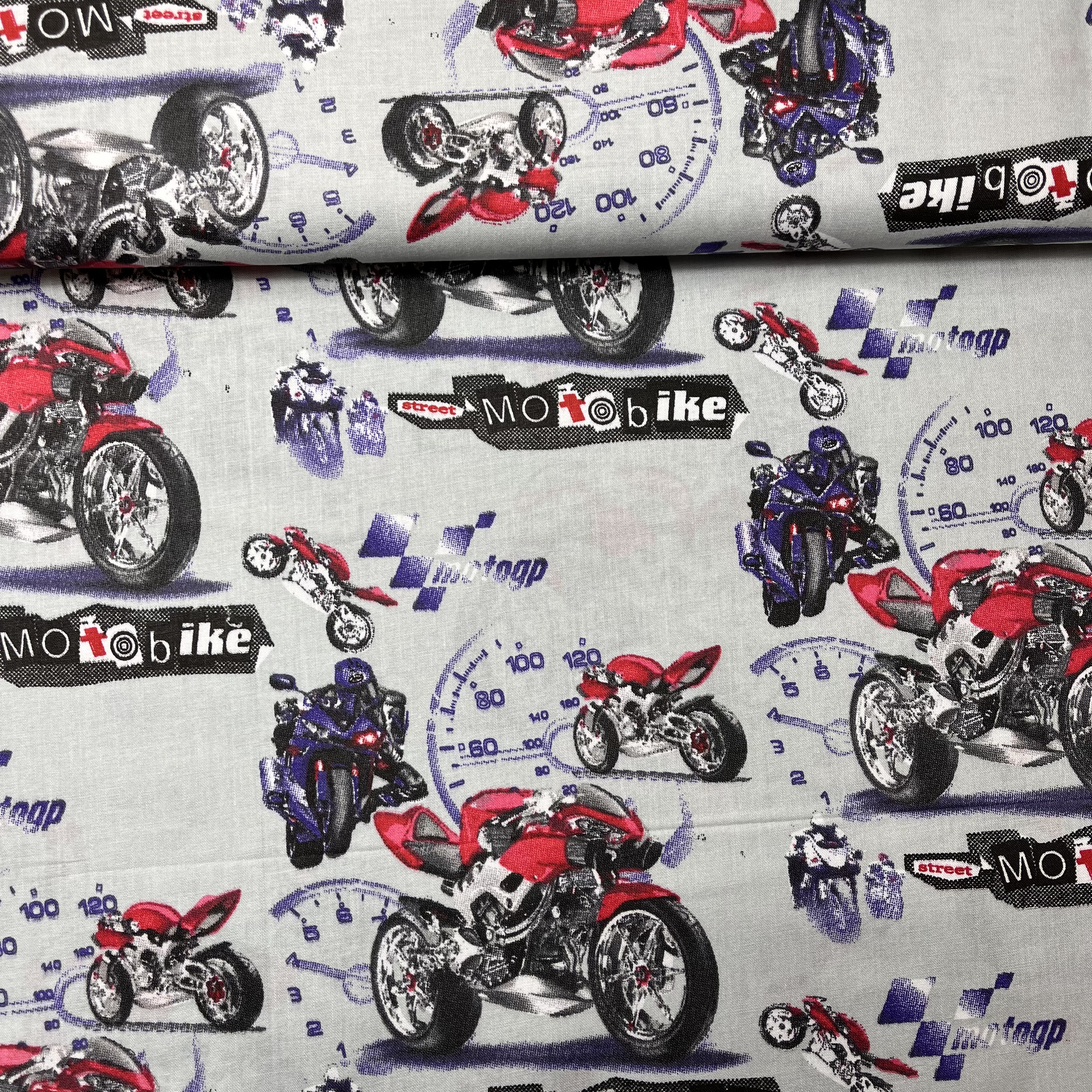 Èervené a fialové motorky na šedé - zvìtšit obrázek